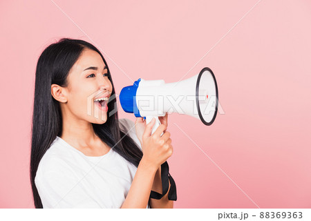 woman teen confident smiling face holding making announcement message shouting screaming in megaphone woman teen confident smiling face holding making announcement message shouting screaming in megaphone 88369363