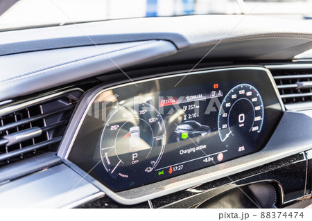 Electric vehicle or EV car display informs about the battery charge level 88374474