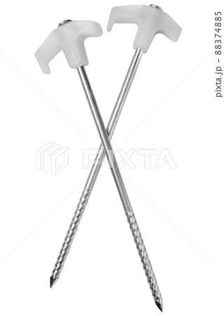 two steel pegs for a tent, with a plastic hook for a rope, on a white background two steel pegs for a tent, with a plastic hook for a rope, on a white background 88374885