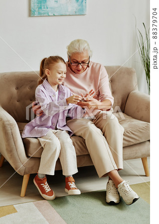 Grandmother with Little Girl 88379704