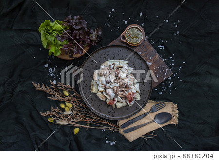 Fresh grilled squid, Octopus tentacles and Squids eggs on Ceramic plate. Fresh grilled squid, Octopus tentacles and Squids eggs on Ceramic plate. 88380204
