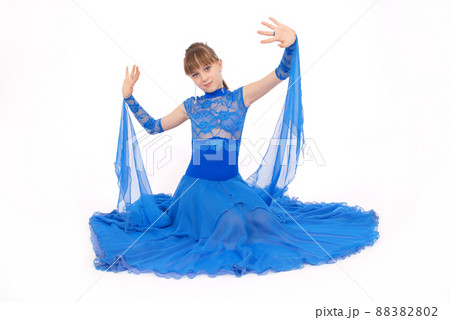 girl in blue dress posing in studio girl in blue dress posing in studio 88382802