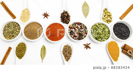 cooking, set of different culinary spices in white ceramic bowls and spoons, on white background, top view cooking, set of different culinary spices in white ceramic bowls and spoons, on white background, top view 88383434