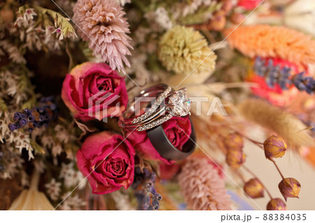 Diamond Wedding Ring with Wedding Band and Bouquet of Dried Wildflowers Diamond Wedding Ring with Wedding Band and Bouquet of Dried Wildflowers 88384035