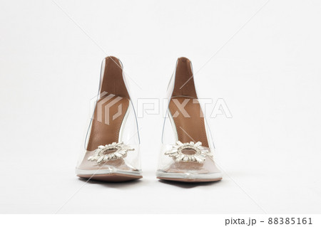 Transparent women's shoes with high heels. Shoes with crystals. Cinderella shoes. Front view Transparent women's shoes with high heels. Shoes with crystals. Cinderella shoes. Front view 88385161