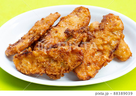 Fried bananas on green background. Fried bananas on green background. 88389039
