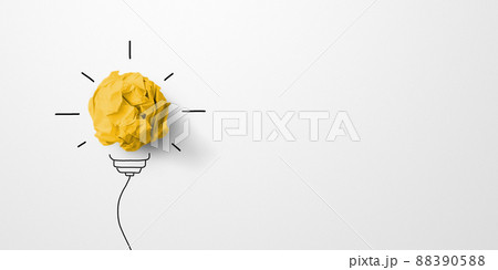 Paper scrap ball yellow colour with light bulb symbol on white background Paper scrap ball yellow colour with light bulb symbol on white background 88390588