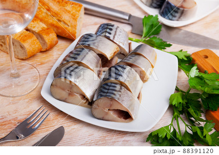 Salted mackerel with bread on plate Salted mackerel with bread on plate 88391120