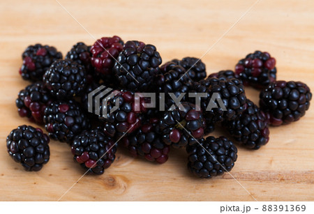 Blackberries on wooden table 88391369