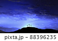 Three crosses on the hill with clouds moving on the blue starry sky 88396235
