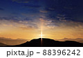 Bright cross on the hill with clouds moving on the starry sky 88396242