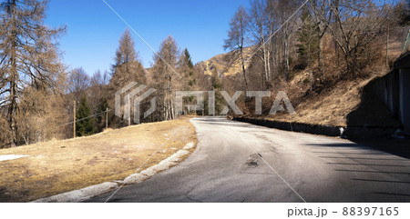 a curving mountain road a curving mountain road 88397165