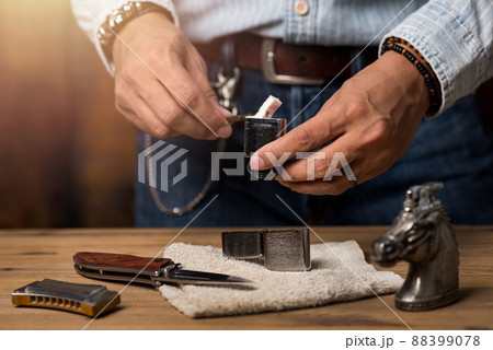 refilling the lighter refilling the lighter 88399078