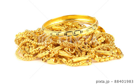 Group of gold jewelry - bracelet, necklace isolated on white Group of gold jewelry - bracelet, necklace isolated on white 88401983