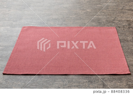Perspective view of red tablecloth for food on cement background. Empty space for your design Perspective view of red tablecloth for food on cement background. Empty space for your design 88408336
