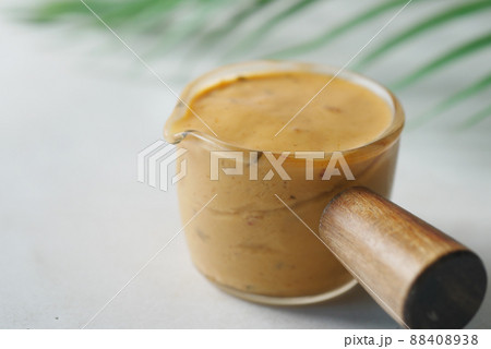 close up of Mayonnaise in container on table . 88408938