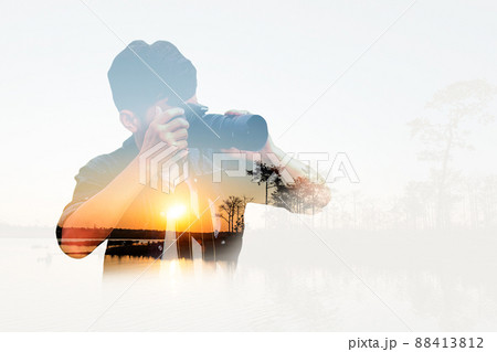 Double exposure portrait of photographer using DSLR camera take photo Double exposure portrait of photographer using DSLR camera take photo 88413812