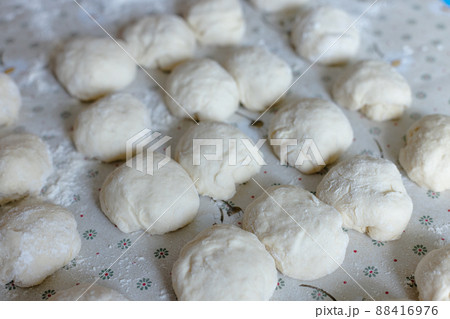 Balls from the dough for pies. Baking at home. Selective focus. 88416976