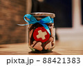 Jar with cookies in form of hearts and swiss flag cookie 88421383