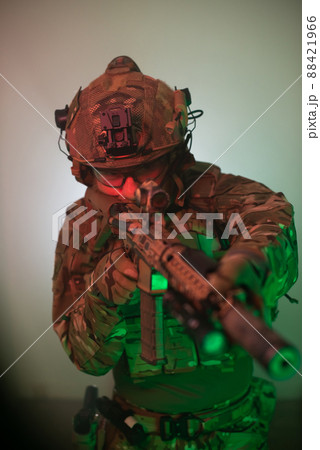 Devoted man aiming with machinegun Devoted man aiming with machinegun 88421966