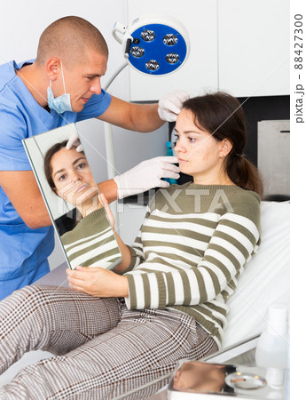 Woman having consultation with doctor in clinic Woman having consultation with doctor in clinic 88427300