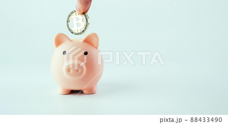 Save money business bitcoin. Pink pig bank with golden bit coin BTC on white background. Save cryptocurrency virtual money concept. 88433490