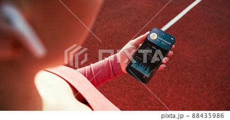 Gym app. Smartphone screen with sport gym or fitness health mobile application. Woman holding app for training indoors.  88435986