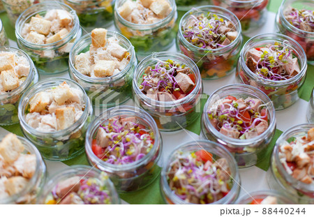 Salad Variationen in glass. Vegetable salad in glass jar. Salad Variationen in glass. Vegetable salad in glass jar. 88440244