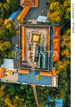 Aerial view of Wat Phrathat Doi Kham, Buddha pagoda and golden chedi in Chiang Mai, Thailand Aerial view of Wat Phrathat Doi Kham, Buddha pagoda and golden chedi in Chiang Mai, Thailand 88442019