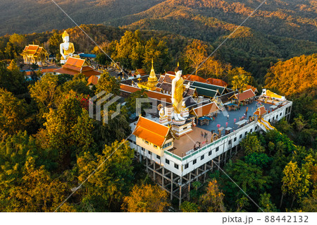 Aerial view of Wat Phrathat Doi Kham, Buddha pagoda and golden chedi in Chiang Mai, Thailand 88442132