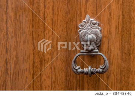 Iron antique door retro vintage style old handle, close-up 88448346