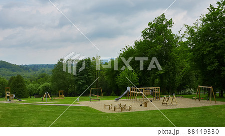 Colorful playground on yard in the park. Colorful playground on yard in the park. 88449330