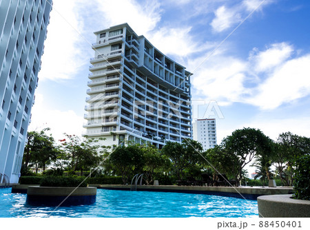 The high rise building view from the swimming pool The high rise building view from the swimming pool 88450401