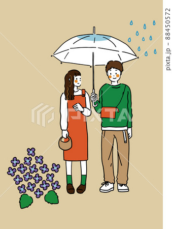 梅雨の季節に雨の中傘をさす若い恋人 88450572