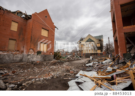 Bila Tserkva, Kyev region Ukraine - 04.03.2022: The consequences of an airstrike, a missile attack on residential buildings in Bila Tserkva. Russian troops destroy houses, people in Ukraine. Bila Tserkva, Kyev region Ukraine - 04.03.2022: The consequences of an airstrike, a missile attack on residential buildings in Bila Tserkva. Russian troops destroy houses, people in Ukraine. 88453013