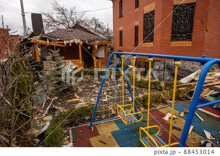Bila Tserkva, Kyev region Ukraine - 04.03.2022: The consequences of an airstrike, a missile attack on residential buildings in Bila Tserkva. Russian troops destroy houses, people in Ukraine. Bila Tserkva, Kyev region Ukraine - 04.03.2022: The consequences of an airstrike, a missile attack on residential buildings in Bila Tserkva. Russian troops destroy houses, people in Ukraine. 88453014