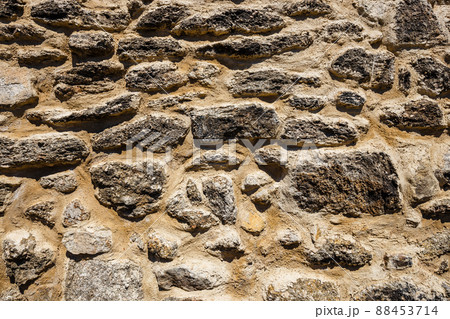 brown stone wall texture closup background brown stone wall texture closup background 88453714