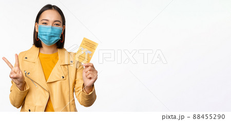 Hey you got point. Cheerful cute asian lively girl dark short haircut pointing camera finger-pistol smiling broadly, encourage friend make move, congratulate coworker good job, stand blue background Hey you got point. Cheerful cute asian lively girl dark short haircut pointing camera finger-pistol smiling broadly, encourage friend make move, congratulate coworker good job, stand blue background 88455290