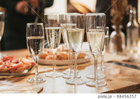 Glasses of champagne and bubbles at a wedding 88456257