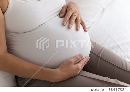Pregnant Woman Big 9 Month Baby Bump Under White Cloth Stock Image