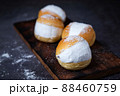 Homemade MARITOZZO is Italian bread stuffed with whipped cream. 88460759