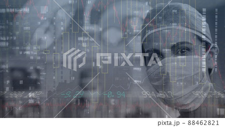 Composite image of financial data processing against caucasian female surgeon wearing surgical mask Composite image of financial data processing against caucasian female surgeon wearing surgical mask 88462821