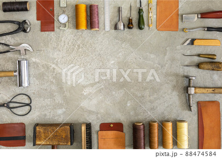 Top view materials and instruments on cutting mat for chopping measurement leatherwork details Top view materials and instruments on cutting mat for chopping measurement leatherwork details 88474584