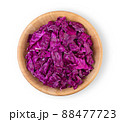 slice purple cabbage in wood bowl isolated on white background. top view 88477723