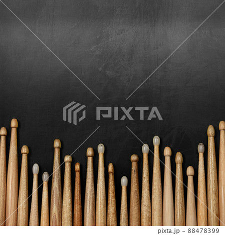 Group of Wooden Drumsticks on a Blackboard with Copy Space 88478399