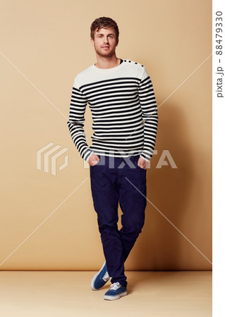 Style is my game. Full length studio portrait of a stylishly-dressed young man smiling at the camera. Style is my game. Full length studio portrait of a stylishly-dressed young man smiling at the camera. 88479330