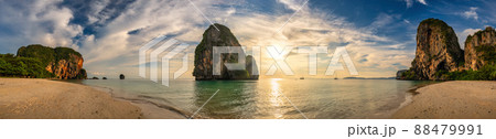 Tropical islands sunset view with ocean sea water at Phra Nang Cave Beach, Krabi Thailand nature landscape panorama Tropical islands sunset view with ocean sea water at Phra Nang Cave Beach, Krabi Thailand nature landscape panorama 88479991