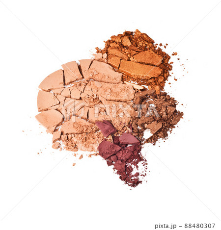 Things of beauty. Studio shot of crushed makeup against a white background. Things of beauty. Studio shot of crushed makeup against a white background. 88480307