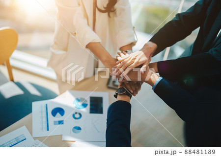 Teamwork business join hand together concept, Business team standing hands together, Volunteer charity work. People joining for cooperation success business 88481189