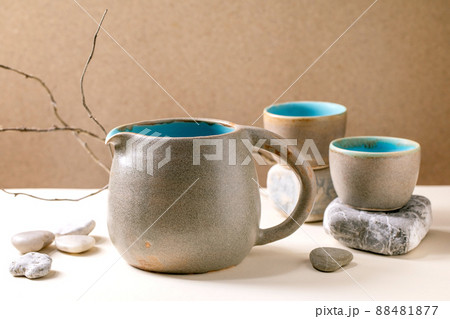 Set of empty grey ceramic cups 88481877